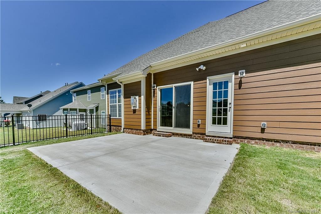 604 Brookhaven Drive, Unit HKC 95 Fort Mill, SC 29708 - Photo 23 of 24 a front view of a house with garden