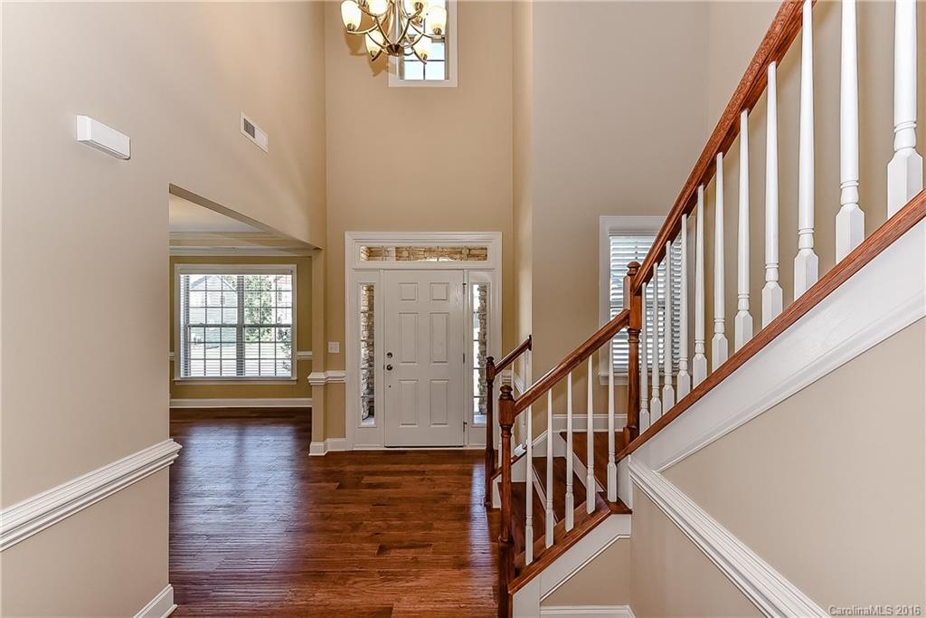 604 Brookhaven Drive, Unit HKC 95 Fort Mill, SC 29708 - Photo 4 of 24 a view of an entryway with wooden floor and stairs