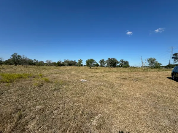 a view of lake with sunset