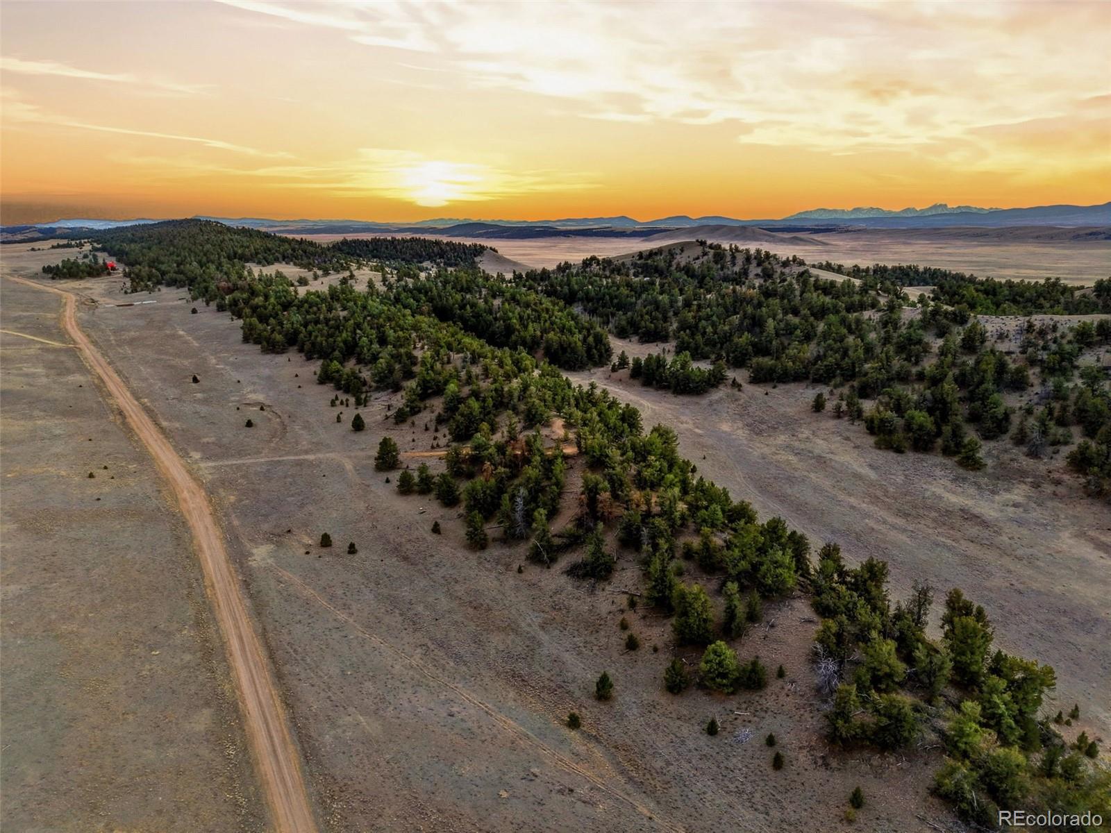 585 Vaquero Way Como, CO 80432 - Photo 1 of 18 a view of a beach with a mountain