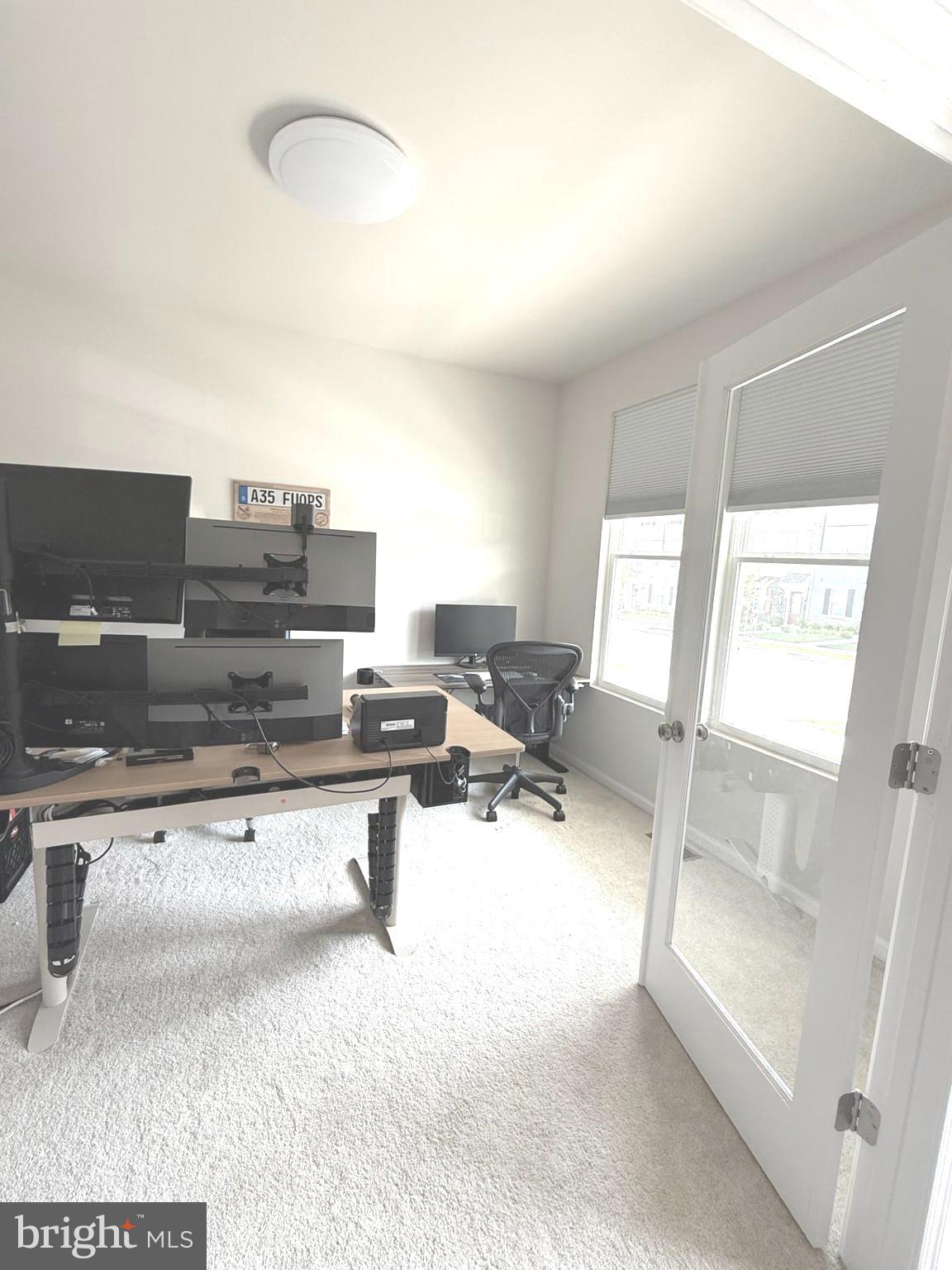 167 Coolidge Avenue Ranson, WV 25438 - Photo 6 of 20 a living room with furniture and a flat screen tv
