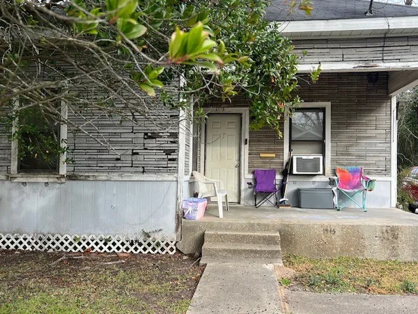 a view of a kid door of the house