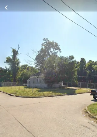 a view of a car in front of house