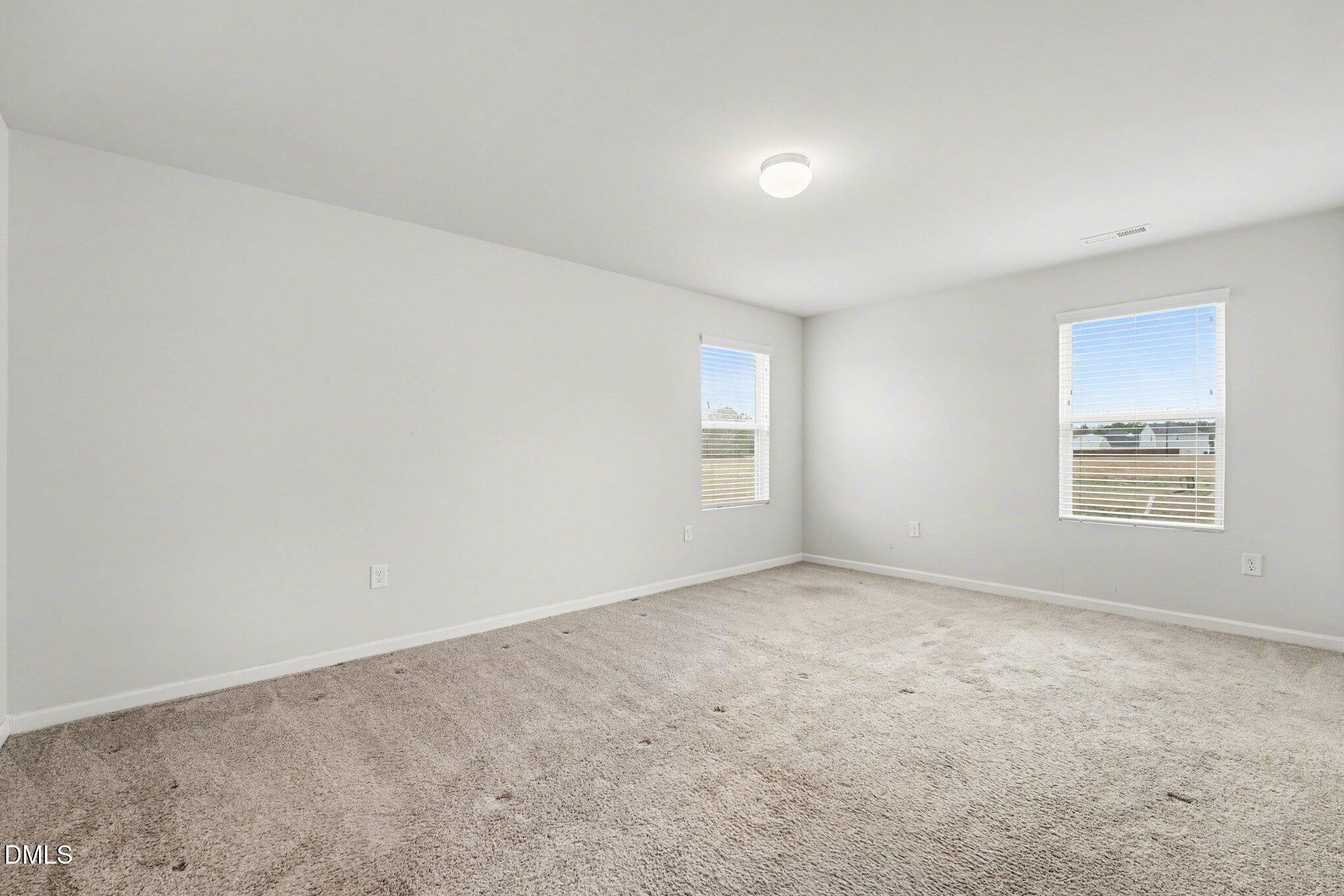 6003 Lowgrass Road Stedman, NC 28391 - Photo 16 of 24 an empty room with windows