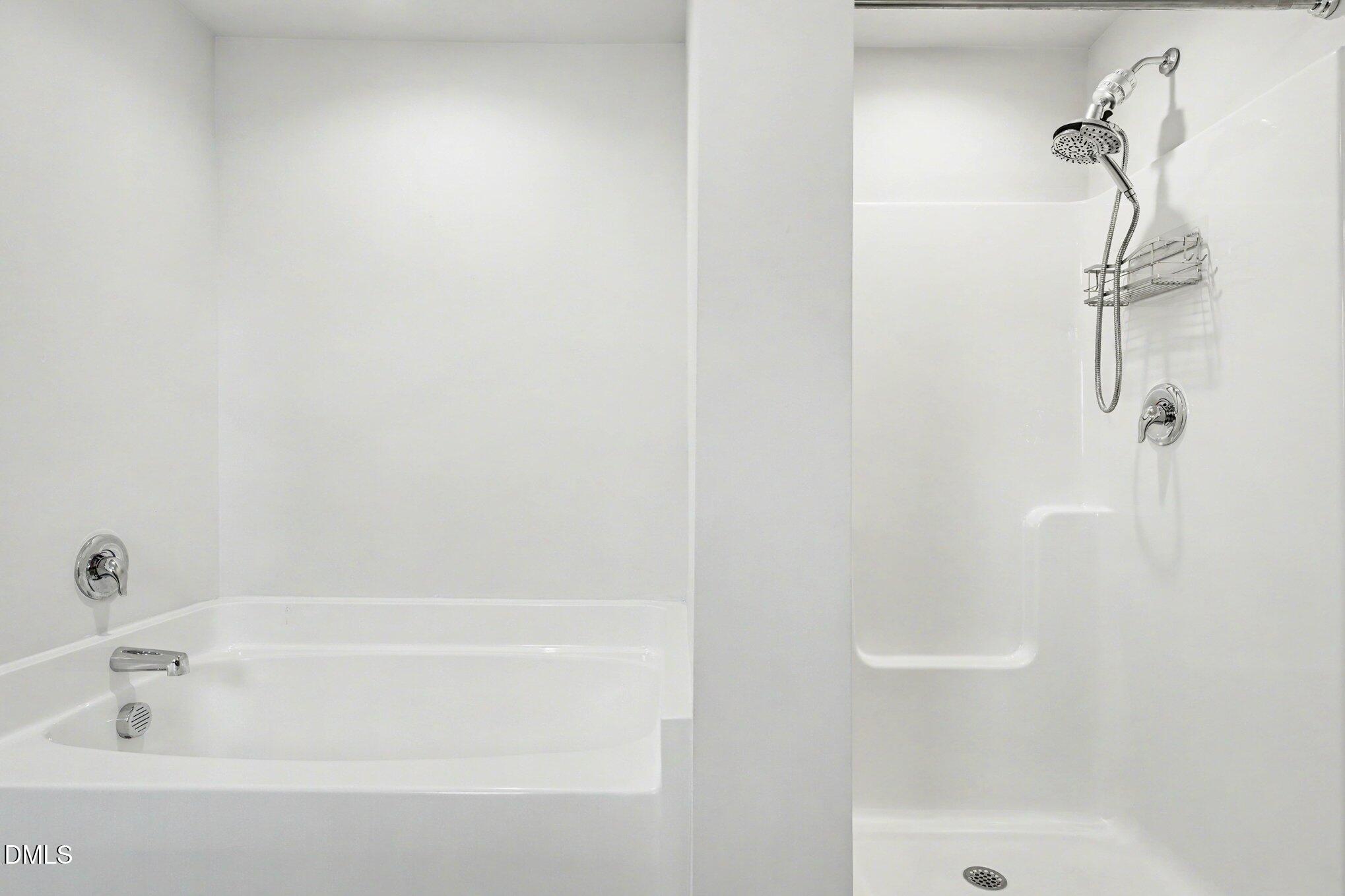 6003 Lowgrass Road Stedman, NC 28391 - Photo 17 of 24 a bathroom with a bathtub