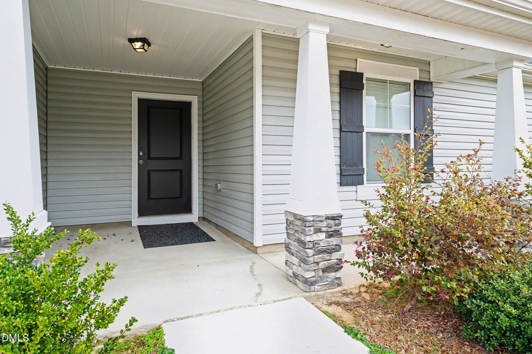 6003 Lowgrass Road Stedman, NC 28391 - Photo 3 of 24 a view of house with patio