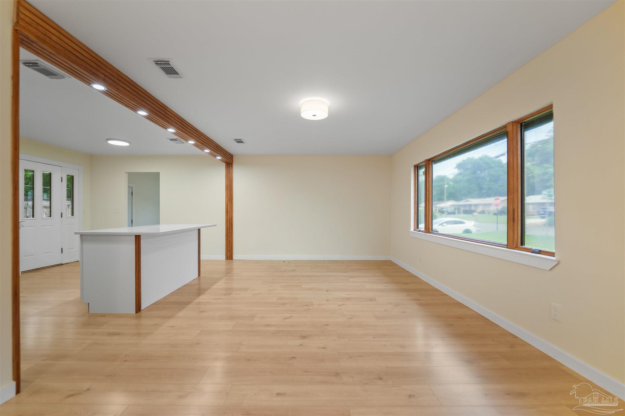 842 Belair Road Pensacola, FL 32505 - Photo 4 of 20 a view of an empty room with a window