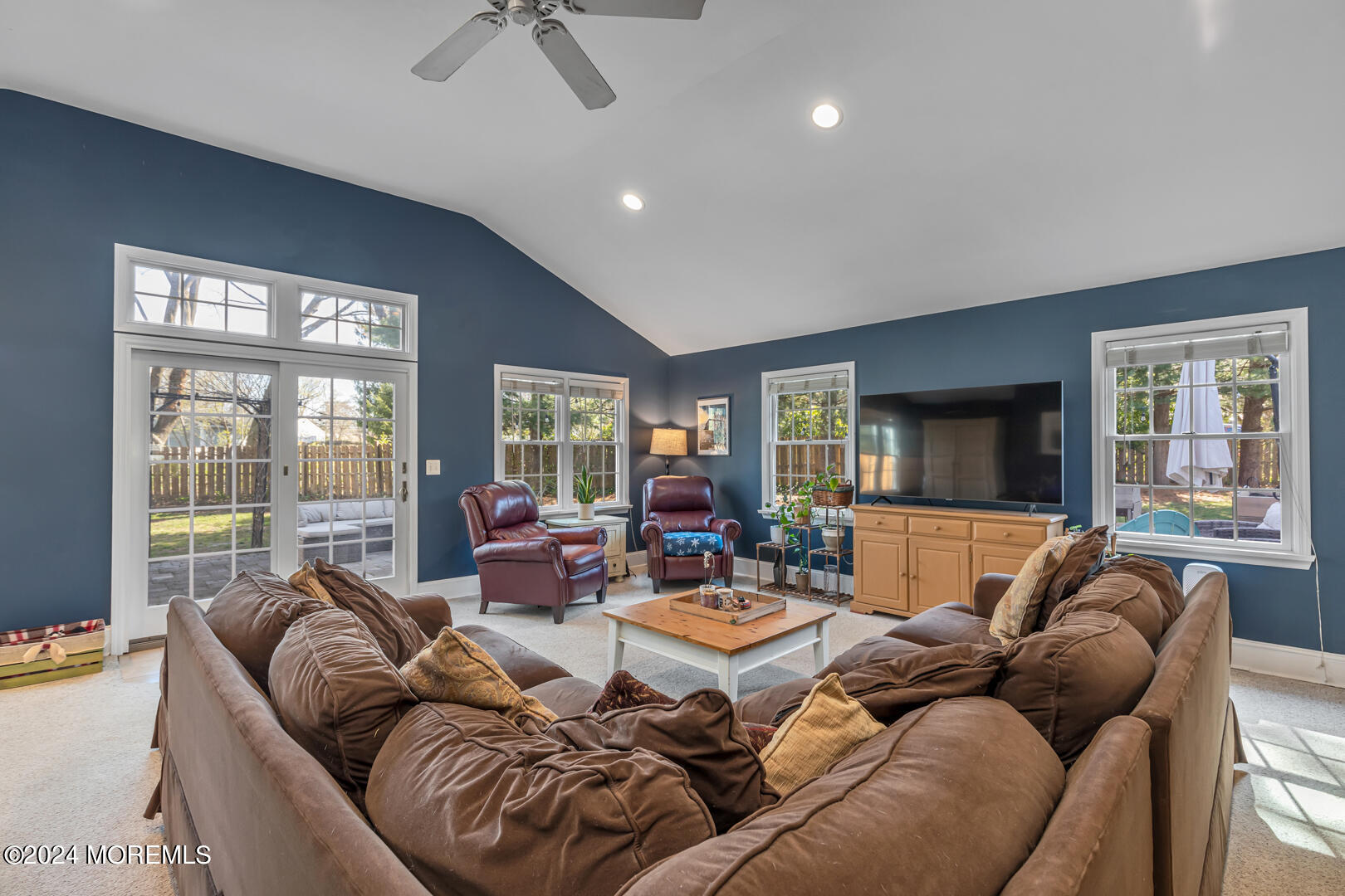 4 Cherry Tree Lane Middletown, NJ 07748 - Photo 14 of 31 a living room with furniture and large windows
