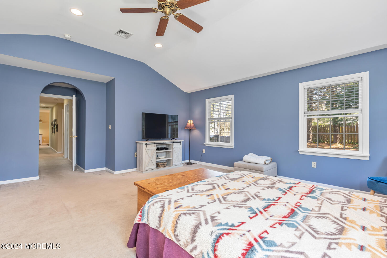 4 Cherry Tree Lane Middletown, NJ 07748 - Photo 17 of 31 a bedroom with a large bed and a flat screen tv