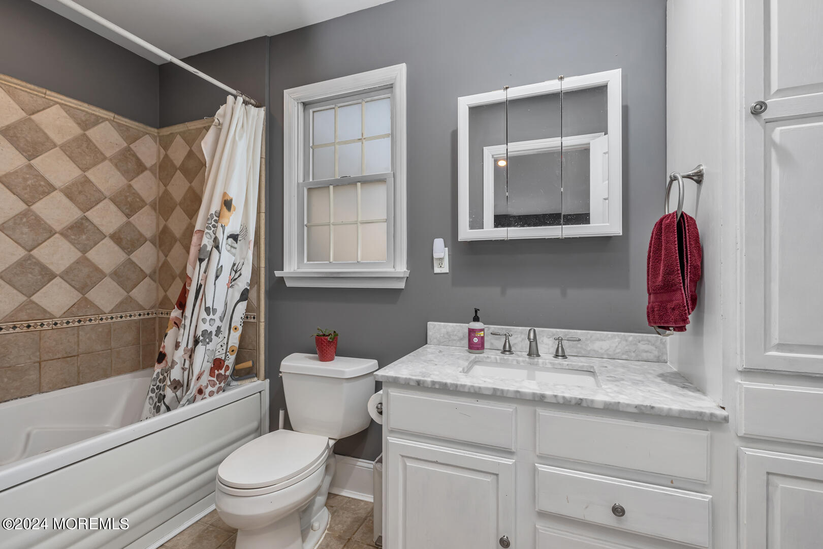 4 Cherry Tree Lane Middletown, NJ 07748 - Photo 23 of 31 a bathroom with a sink toilet and shower