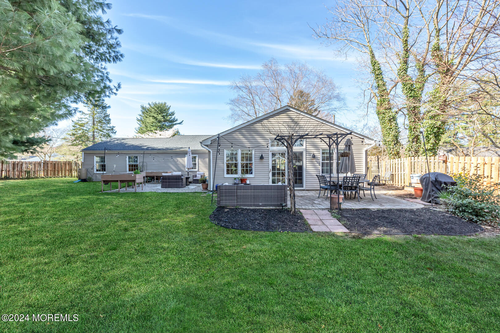 4 Cherry Tree Lane Middletown, NJ 07748 - Photo 24 of 31 a front view of a house with yard and green space
