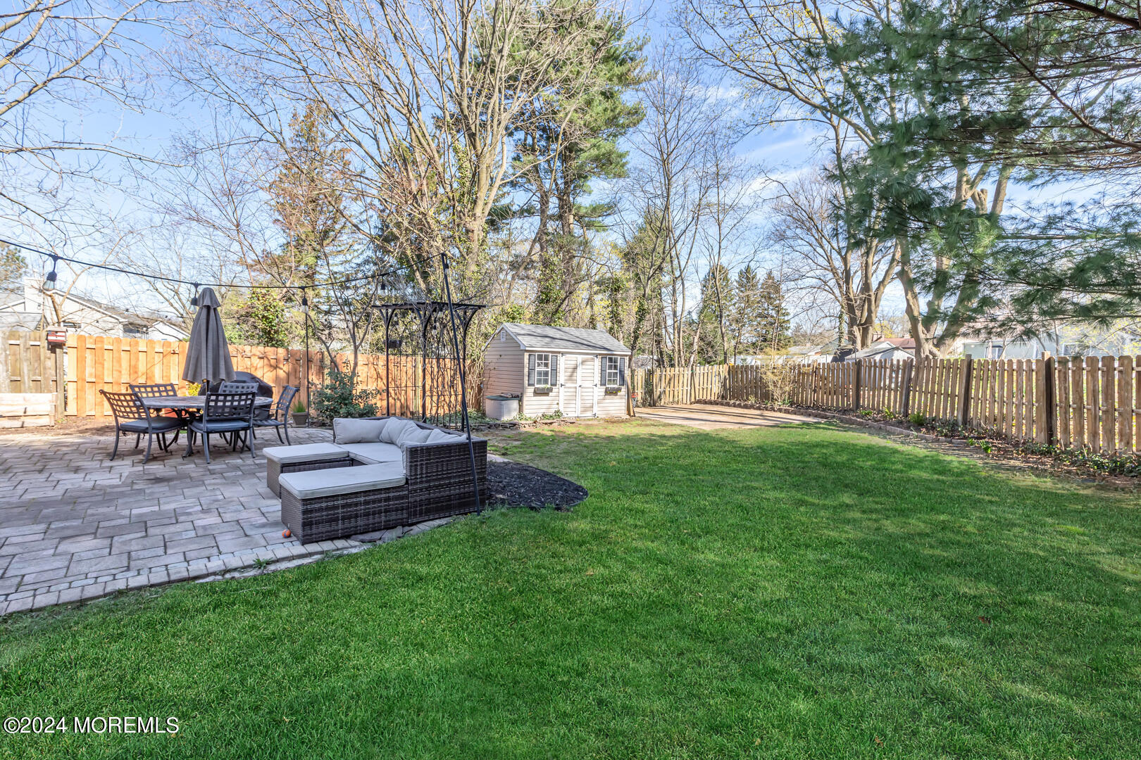 4 Cherry Tree Lane Middletown, NJ 07748 - Photo 26 of 31 a view of a house with backyard and a garden