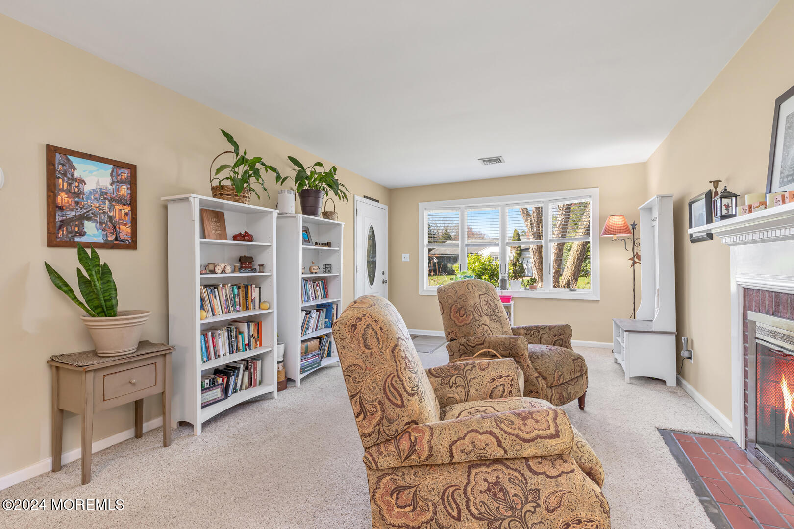 4 Cherry Tree Lane Middletown, NJ 07748 - Photo 3 of 31 a living room with furniture and a book shelf