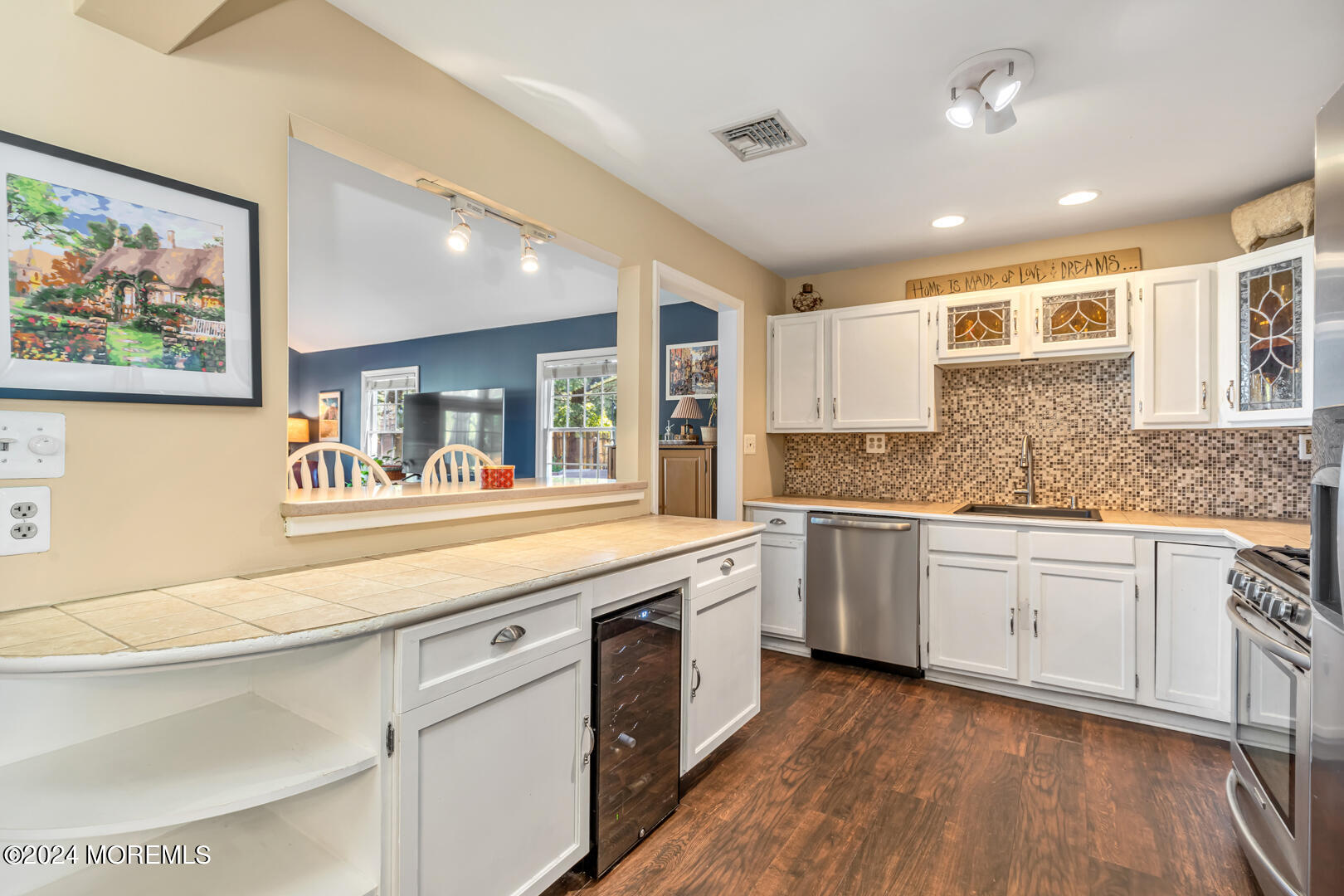 4 Cherry Tree Lane Middletown, NJ 07748 - Photo 8 of 31 a kitchen with stainless steel appliances granite countertop a sink and cabinets