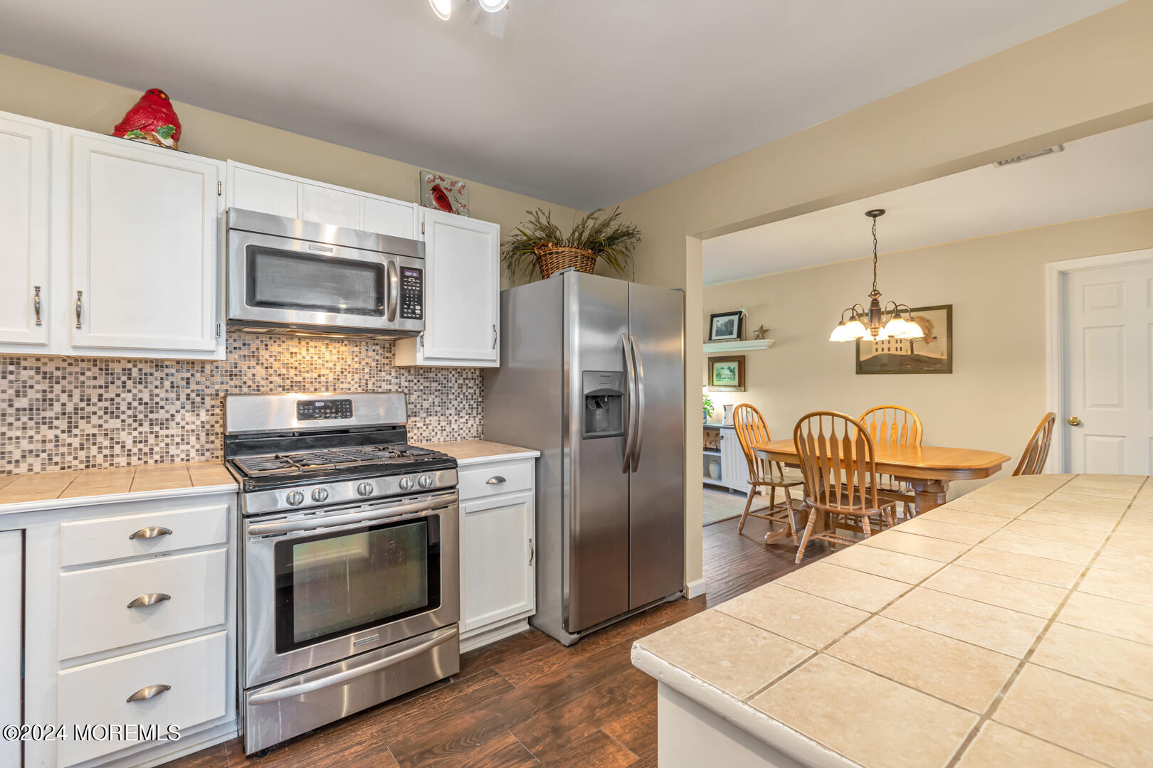 4 Cherry Tree Lane Middletown, NJ 07748 - Photo 9 of 31 a kitchen with stainless steel appliances a stove microwave and a refrigerator