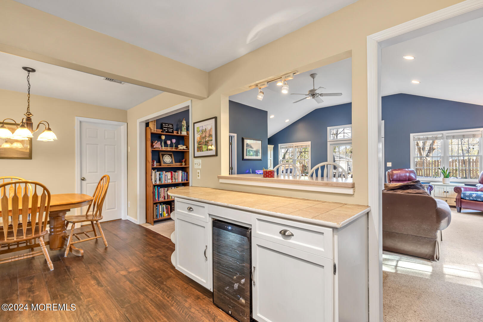 4 Cherry Tree Lane Middletown, NJ 07748 - Photo 10 of 31 a living room with stainless steel appliances furniture and a dining table with wooden floor