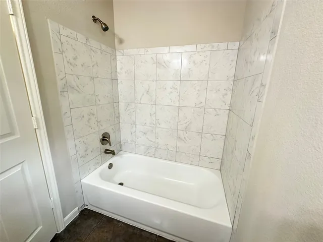 a bathroom with a bathtub