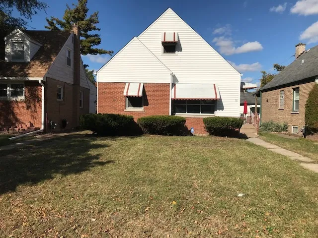 a view of a house with a patio