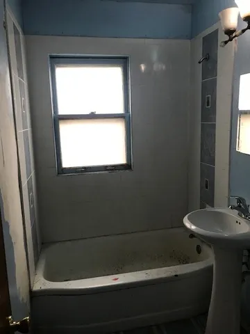 a bathroom with a bathtub