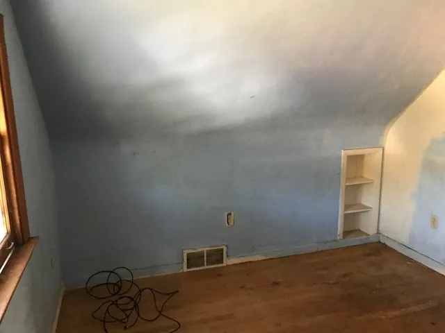 a view of a room with rack on the wall