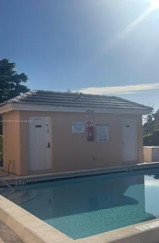 front view of a house with a small yard