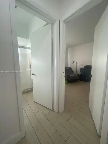 a view of a livingroom with furniture and storage