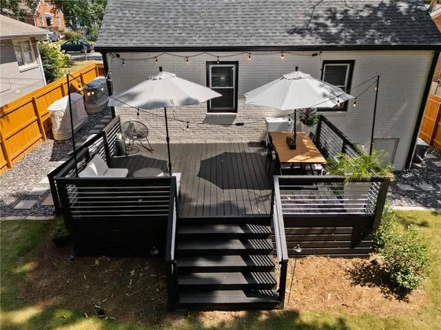 a view of yard with grass and a trees