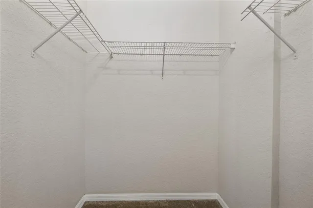 a view of small space with racks on the wall