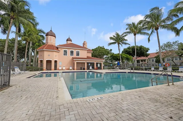 a view of outdoor space yard and swimming pool