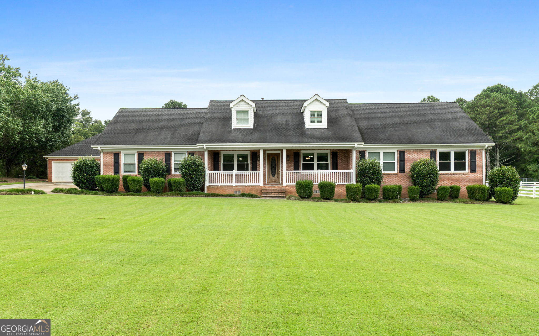 145 Asa Moseley Road McDonough, GA 30252 - Photo 1 of 1 a front view of a house with a garden