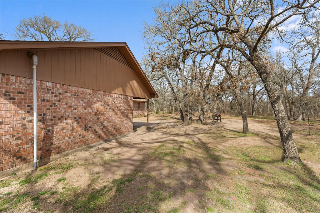 1447 Red Gate Road Mart, TX 76664 - Photo 19 of 38 a view of back yard of the house