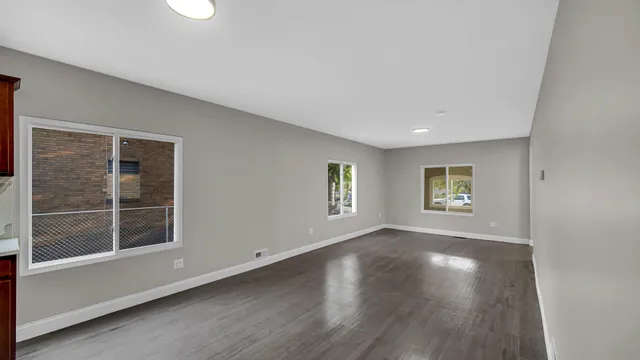 an empty room with windows