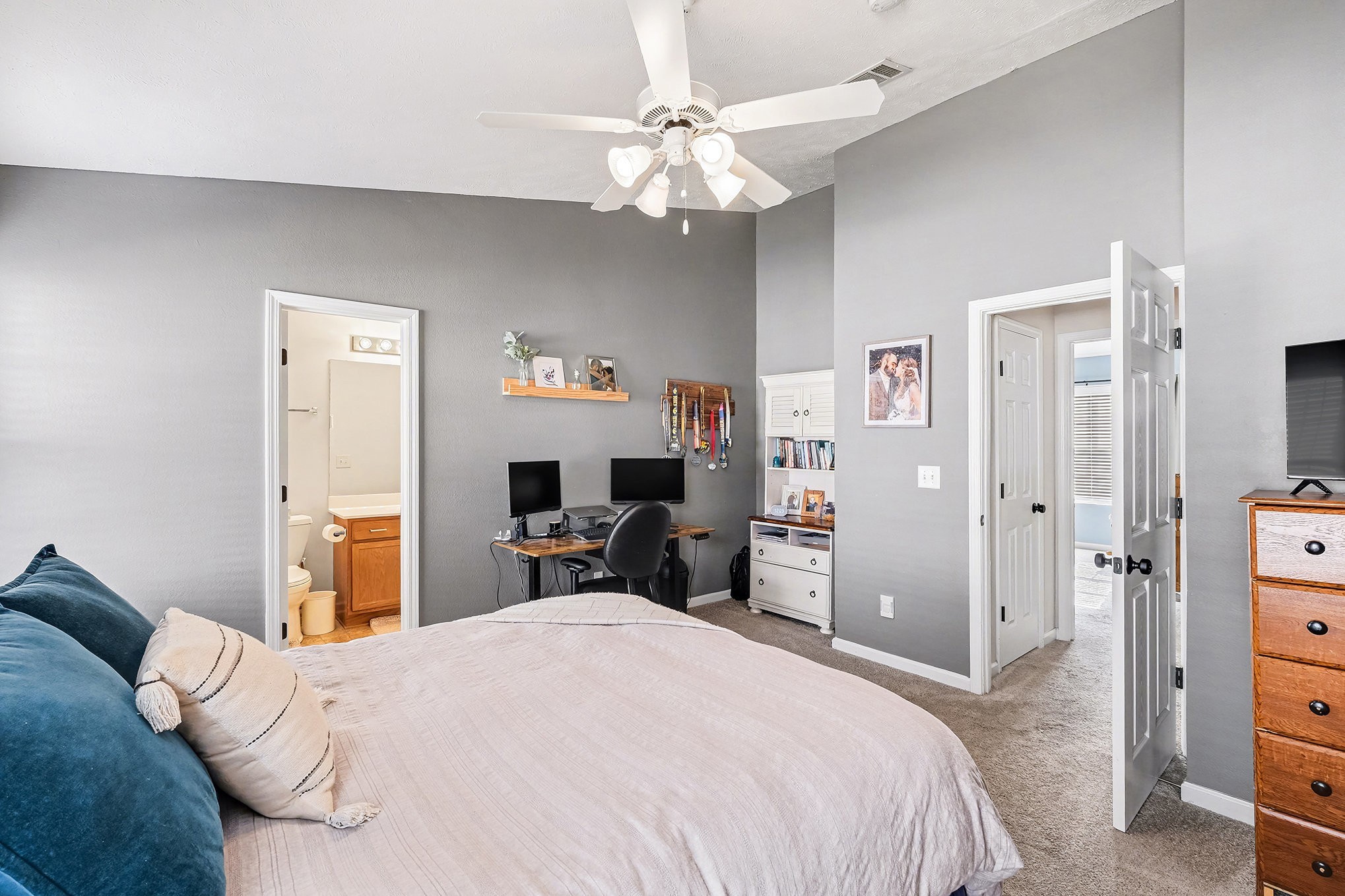 2039 George Buchanan La Vergne, TN 37086 - Photo 8 of 18 a bedroom with a bed and a chandelier