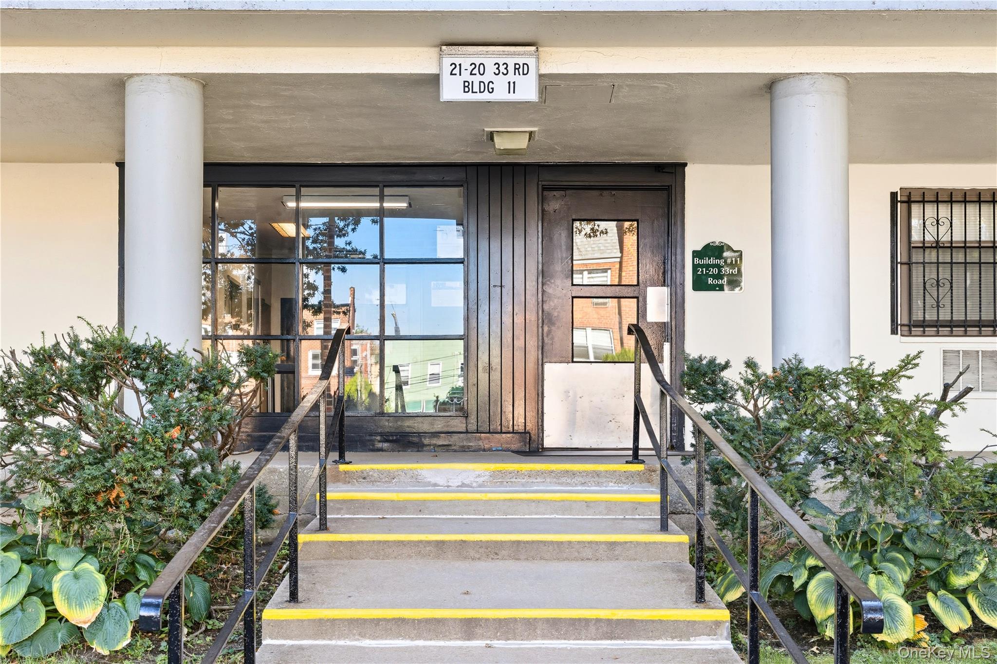 21-20 33rd Road, Unit 15C Queens, NY 11106 - Photo 16 of 18 a view of entryway and hall with wooden floor