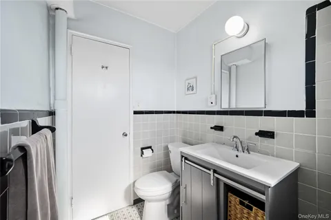 a bathroom with a sink and a toilet