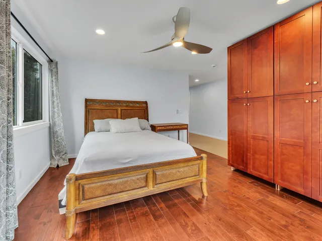 a bed room with a bed and a lamp