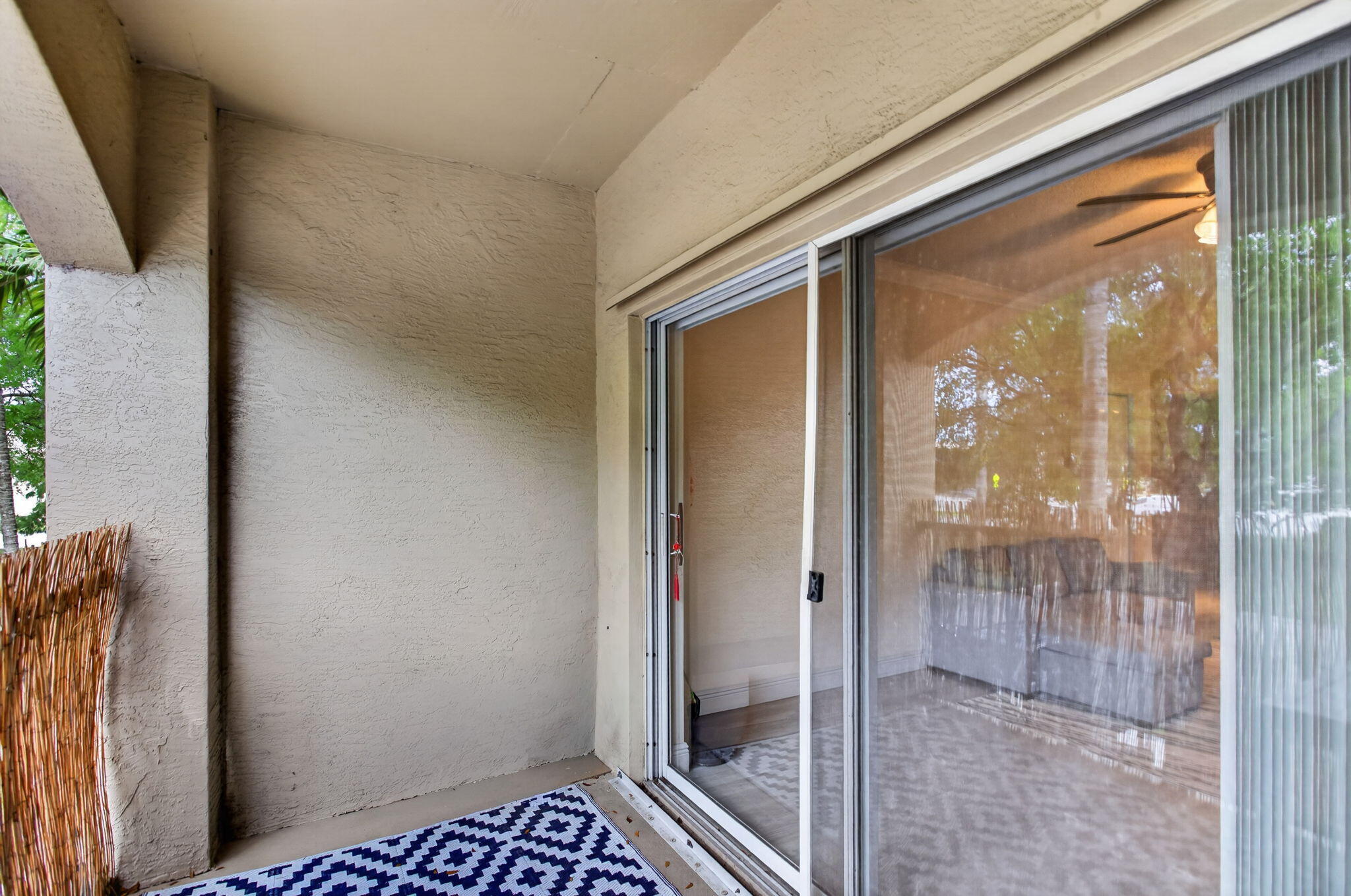 5880 West Sample Road, Unit 206 Coral Springs, FL 33067 - Photo 24 of 37 a bathroom with a glass shower door
