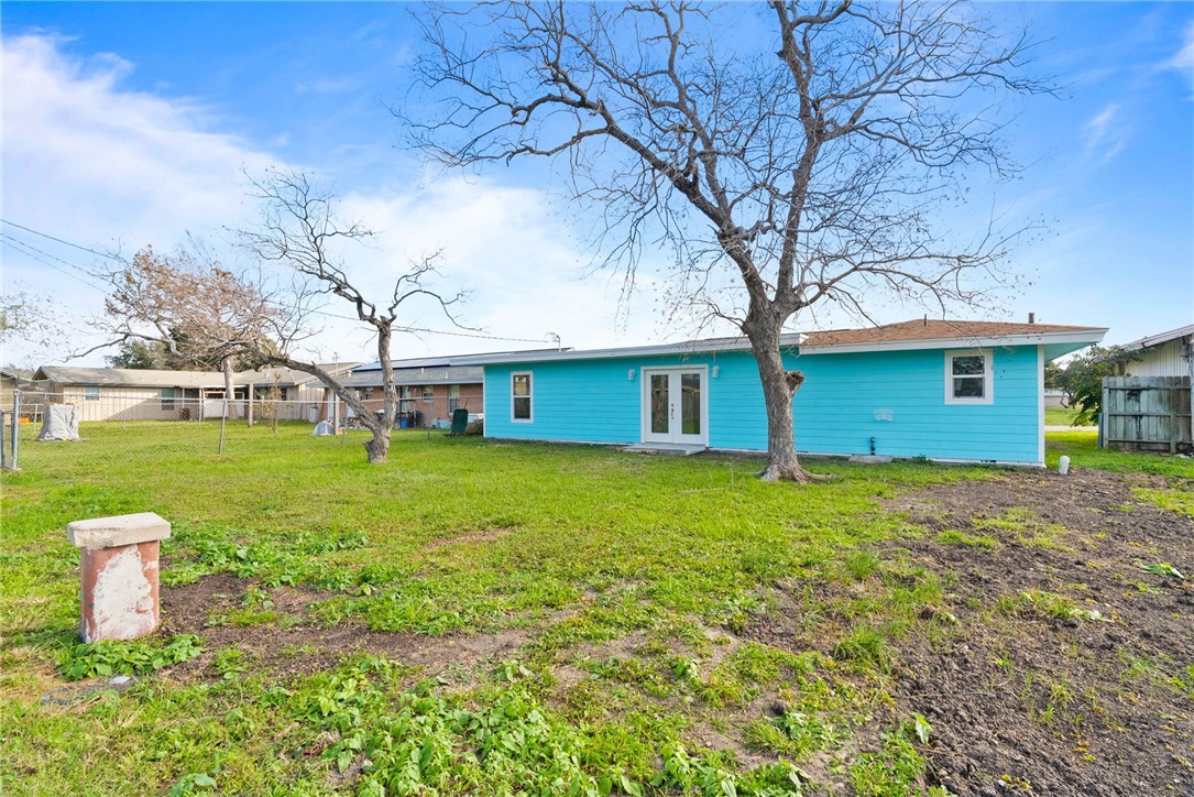 1703 Austin Street Portland, TX 78374 - Photo 13 of 13 a view of a house with backyard