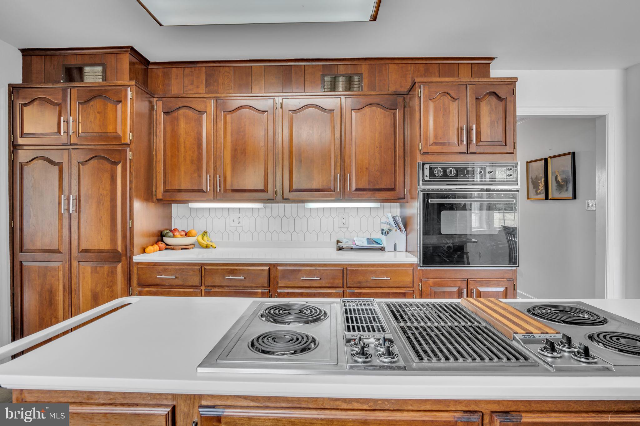 2242 Scotland Road Chambersburg, PA 17201 - Photo 13 of 63 a kitchen with stainless steel appliances granite countertop a refrigerator and cabinets