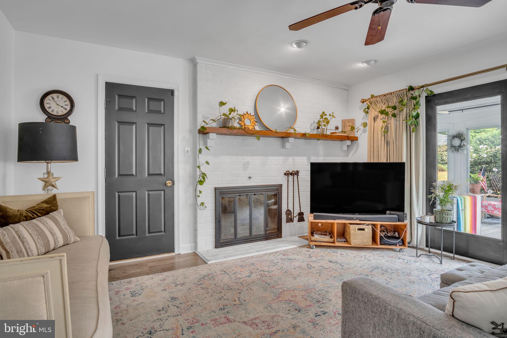 2242 Scotland Road Chambersburg, PA 17201 - Photo 18 of 63 a living room with furniture and a flat screen tv