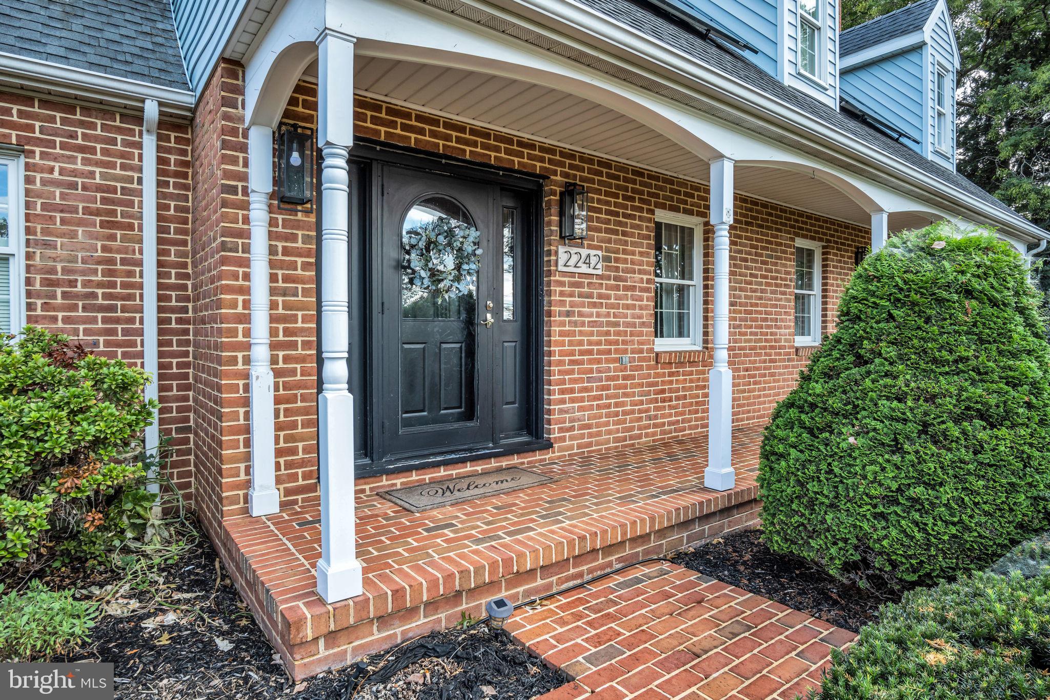 2242 Scotland Road Chambersburg, PA 17201 - Photo 2 of 63 a front view of a house with a garden