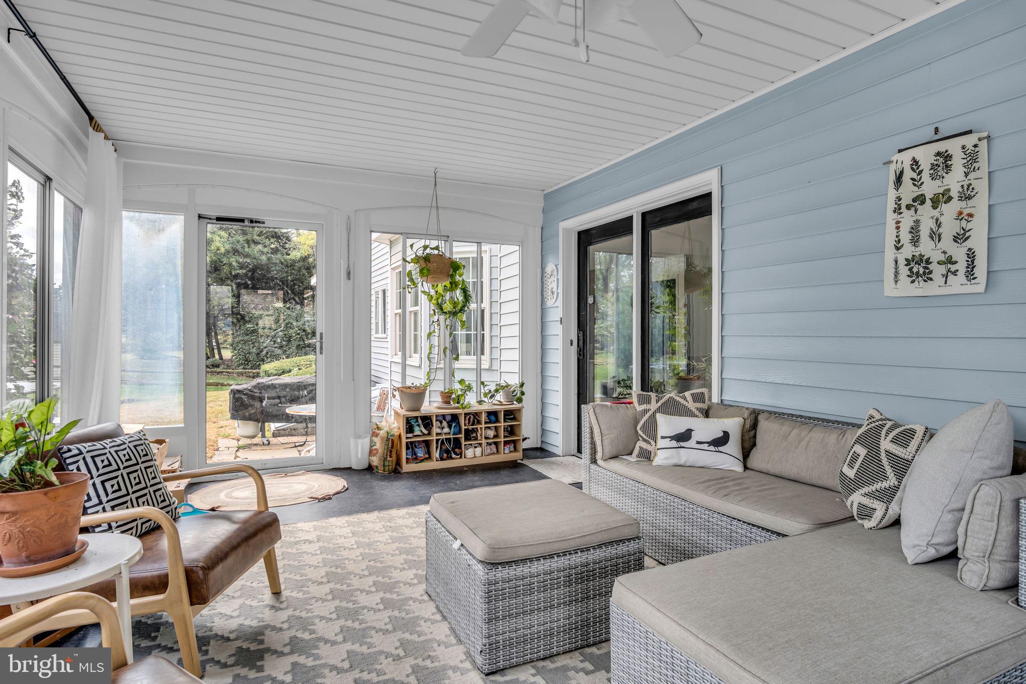 2242 Scotland Road Chambersburg, PA 17201 - Photo 21 of 63 a living room with furniture and large windows