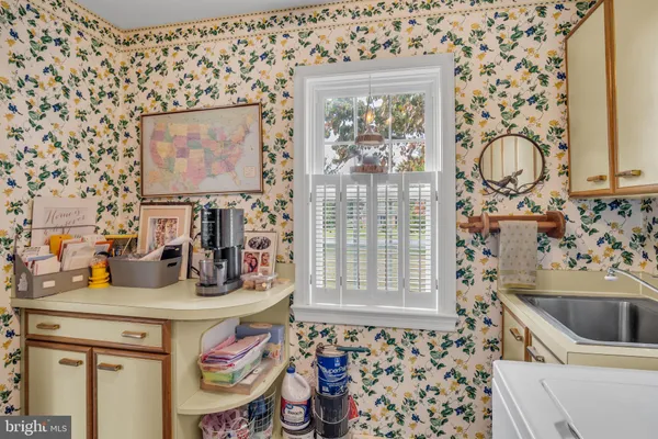 a workspace with furniture and a wooden floor