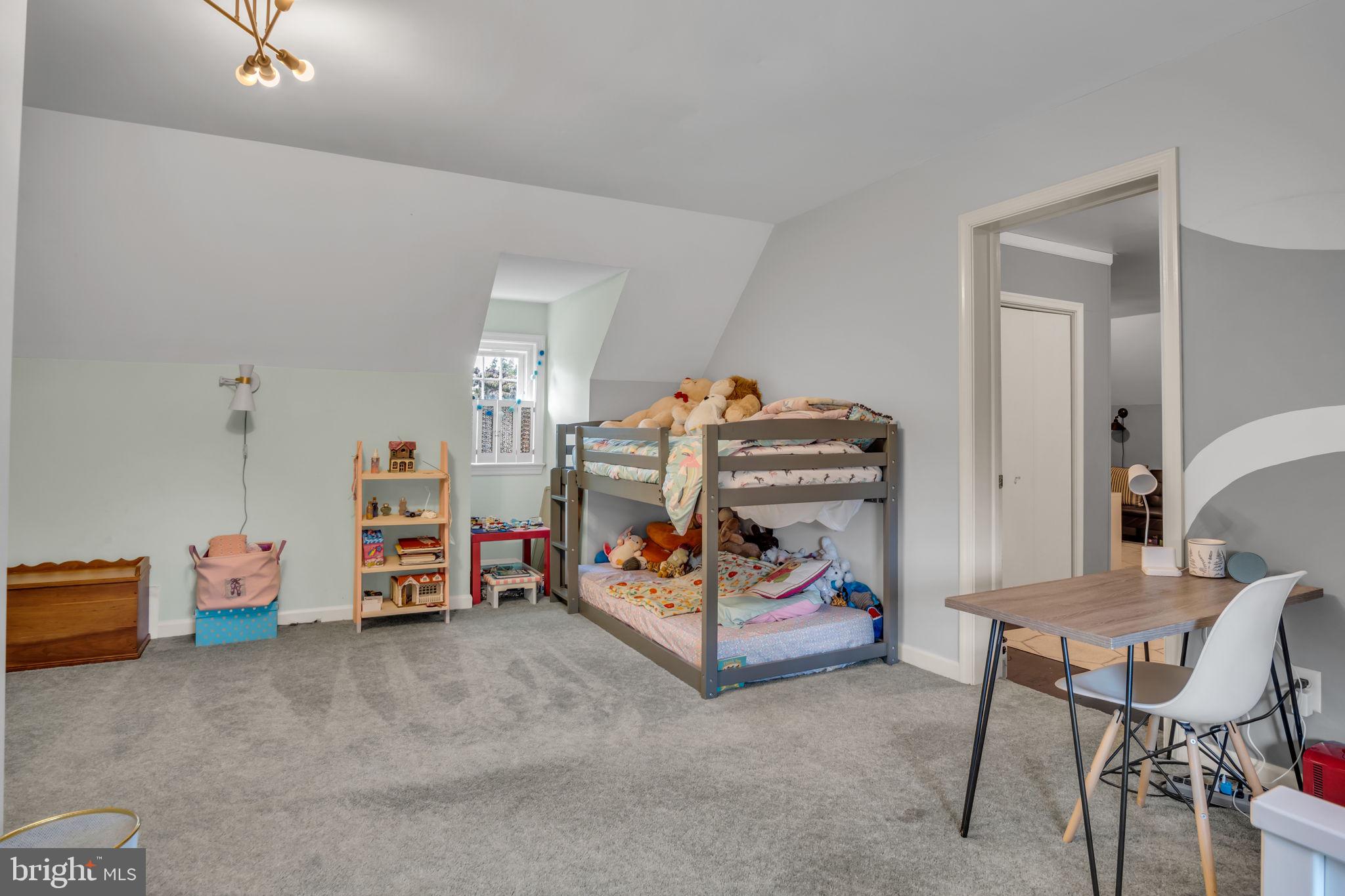 2242 Scotland Road Chambersburg, PA 17201 - Photo 39 of 63 a bedroom with furniture and a chair