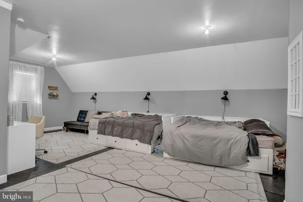 a view of a house with pool and garden