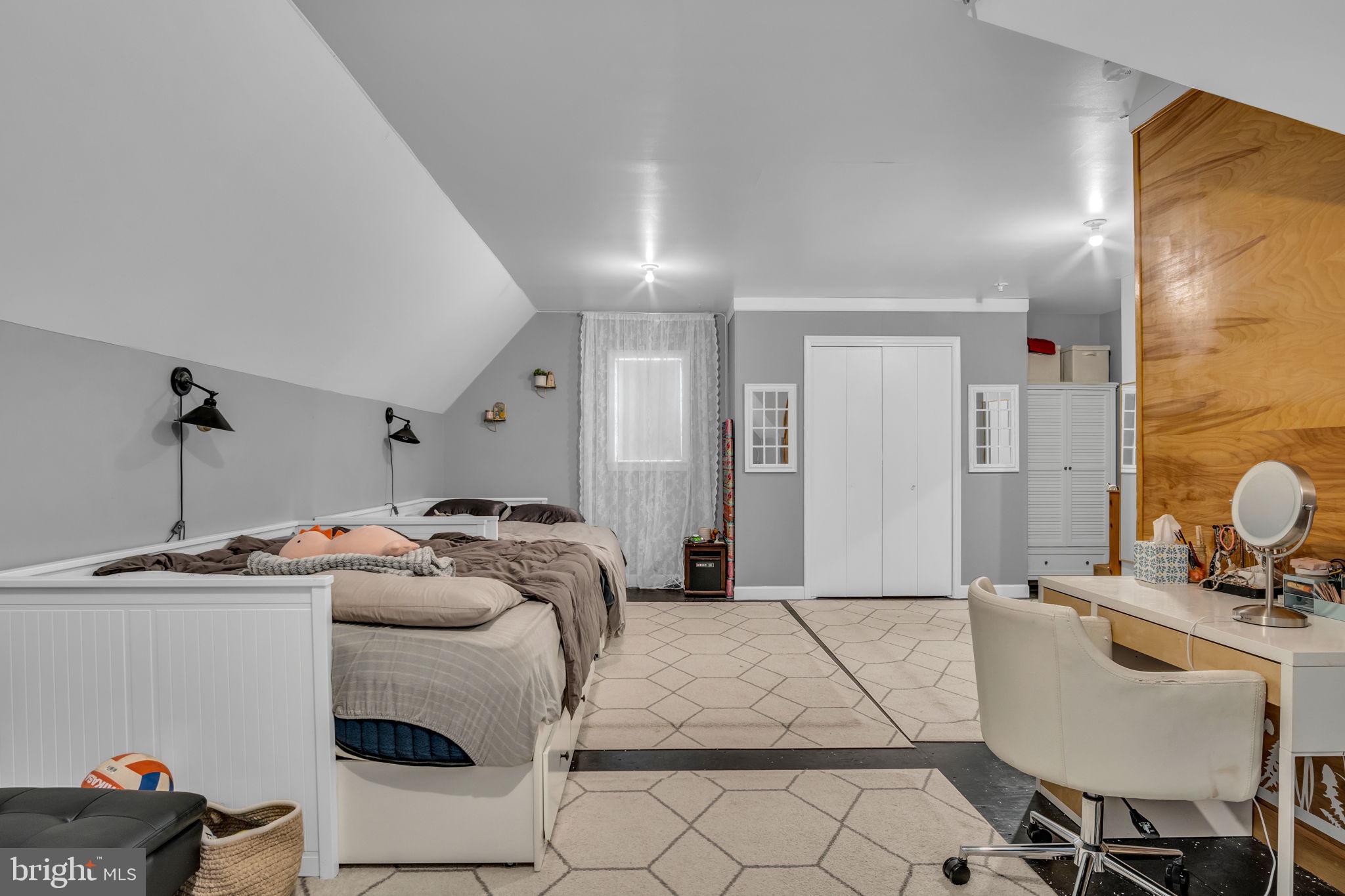 2242 Scotland Road Chambersburg, PA 17201 - Photo 43 of 63 a bedroom with a bed and gym equipment