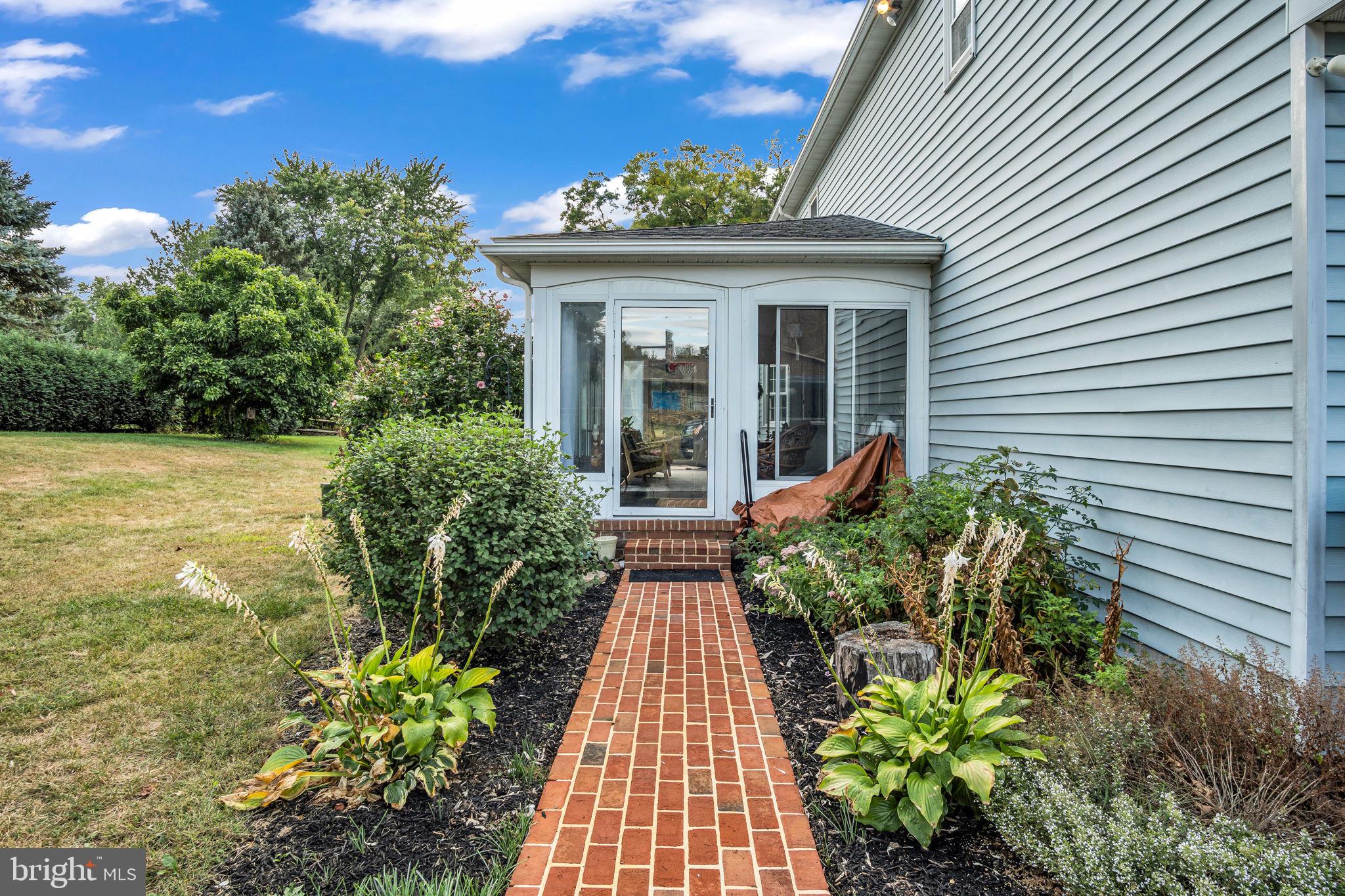 2242 Scotland Road Chambersburg, PA 17201 - Photo 47 of 63 a view of a house with potted plants