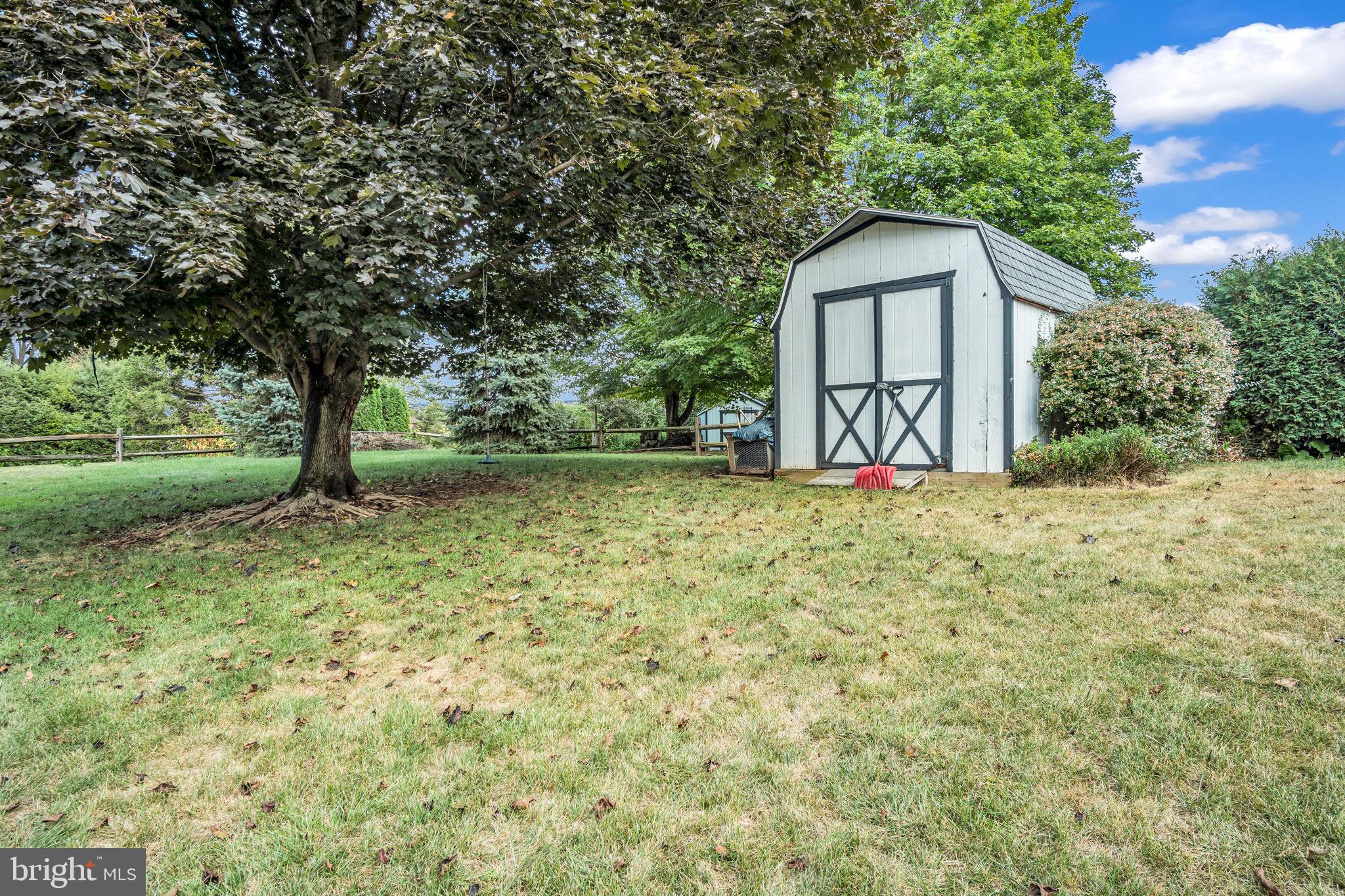 2242 Scotland Road Chambersburg, PA 17201 - Photo 48 of 63 a house with trees in the background