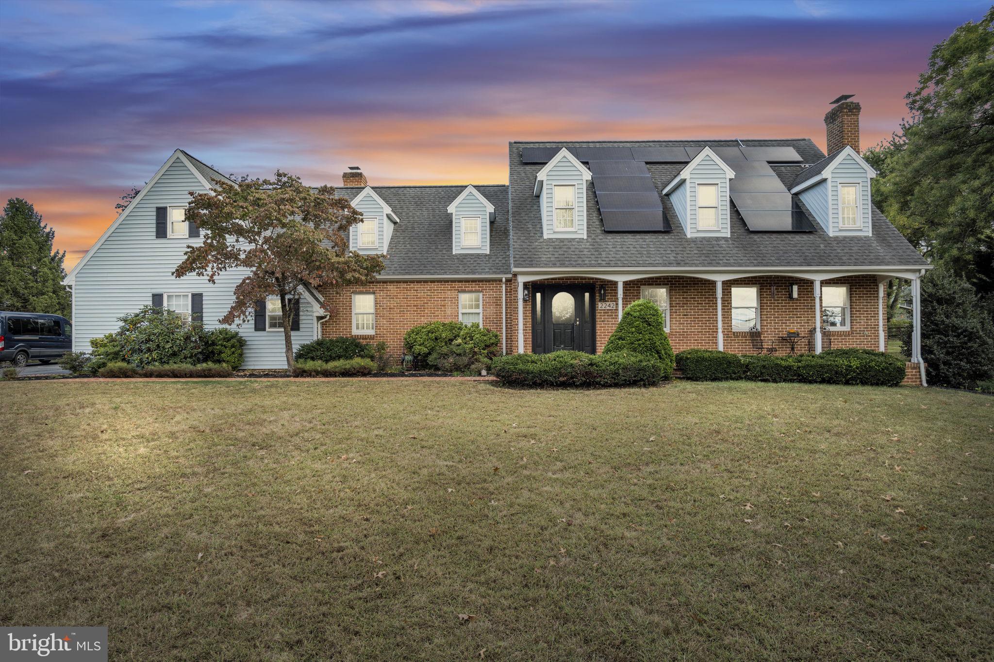 2242 Scotland Road Chambersburg, PA 17201 - Photo 59 of 63 a front view of a house with a garden