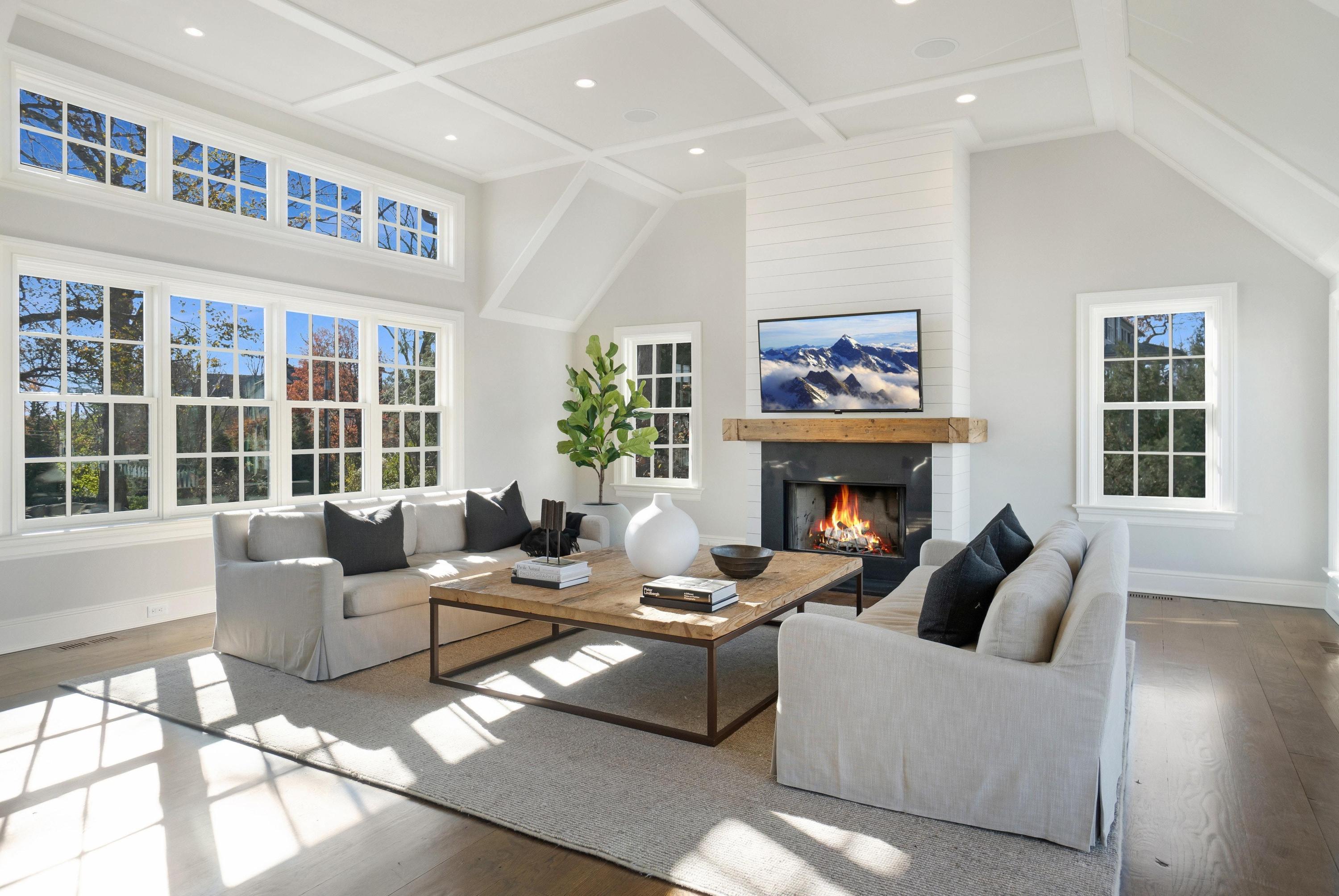 5 N Road Darien, CT 06820 - Photo 12 of 38 a living room with furniture large window and a fireplace